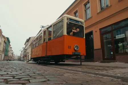 Vintage Streetcar on Cobblestone Street