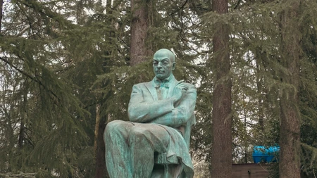 Statue in a Forested Area