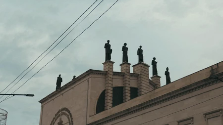 Statues on a Rooftop