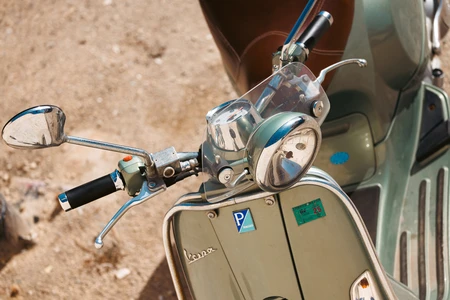 Classic Scooter on Sandy Background