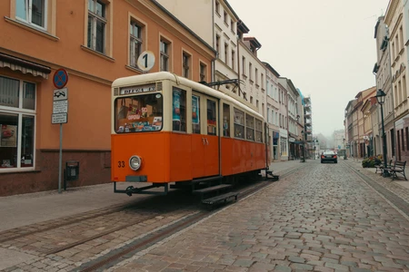 Vintage Streetcar on Cobblestone Street