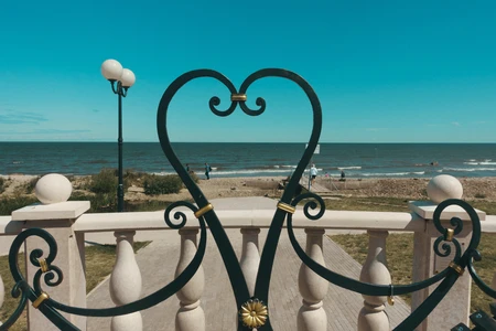 Seaside View Through a Decorative Gate