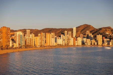 Beachfront City Skyline at Sunset