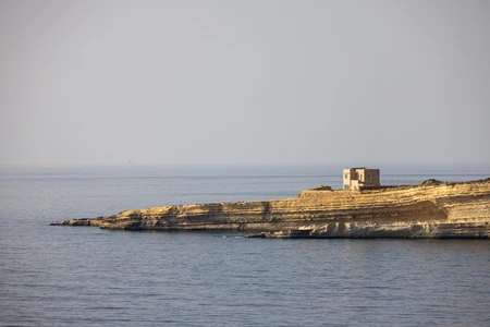 Seaside Cliff with Building