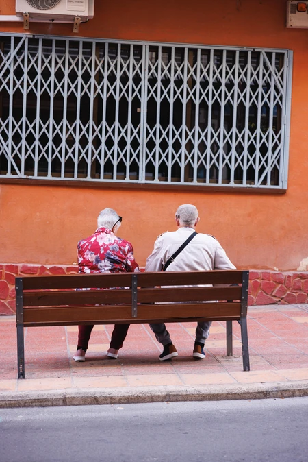 Elderly Couple on a Bench