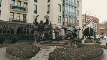 Statue with Building Backdrop