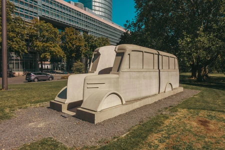 Bus Sculpture in Urban Park