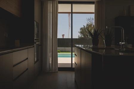 Modern Kitchen Overlooking Pool