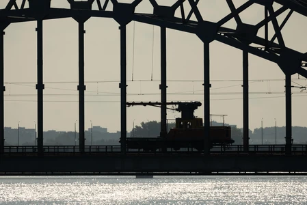 Silhouette of a Train on a Bridge