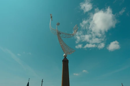 Modern Sculpture Against Blue Sky