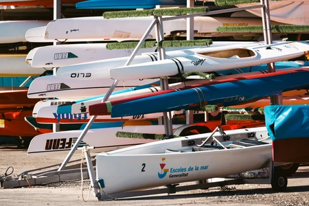 Colorful Canoes by the Shore