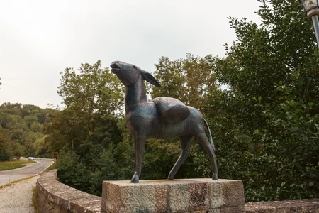 Bronze Animal Statue on Stone Pedestal