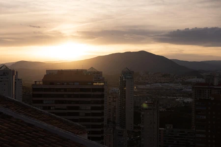 Sunset Over Urban Skyline
