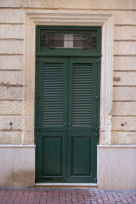 Green Shuttered Doorway