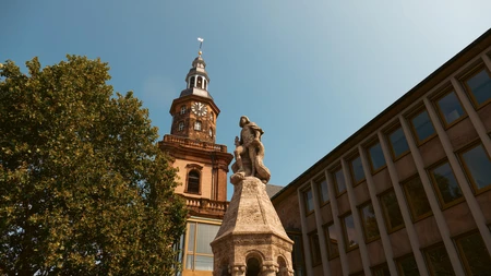 Historic Clock Tower and Statue