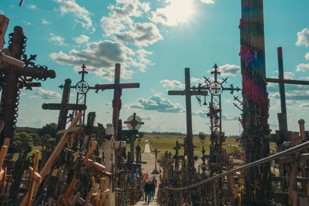 Hill of Crosses Under a Bright Sky