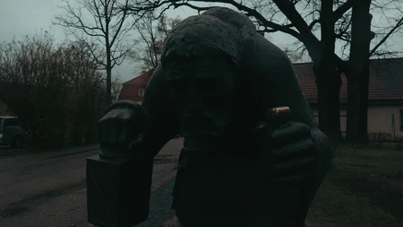 Dark Sculpture in Urban Setting