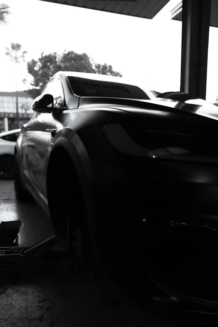 Sleek Car in Shadowy Garage