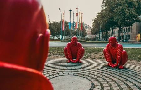 Red Statues in Urban Setting