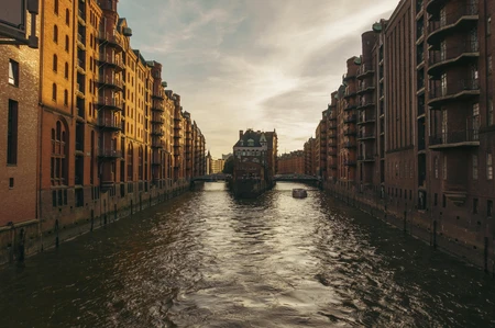 Sunset Over Canal Architecture