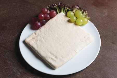Cheese and Grapes on Plate