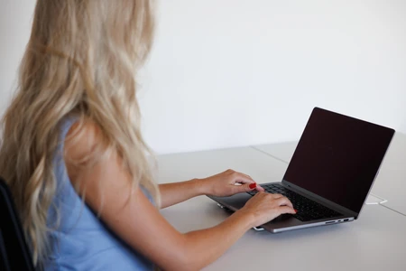Woman Working on Laptop