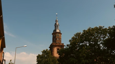 Historic Clock Tower against Blue Sky
