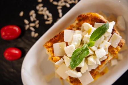 Gourmet Dish with Cheese and Basil