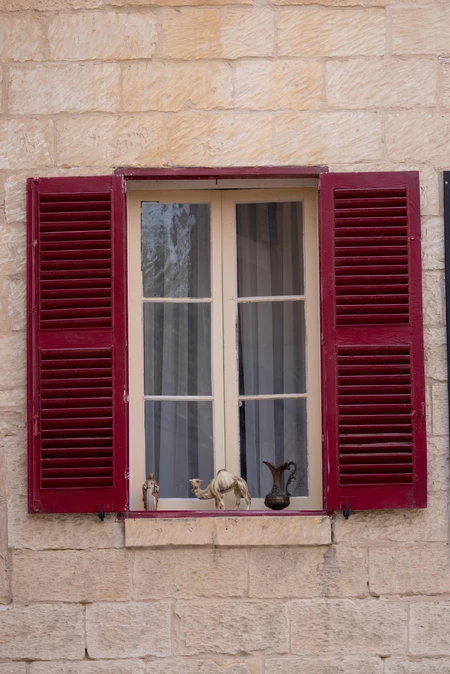 Vintage Window with Red Shutters