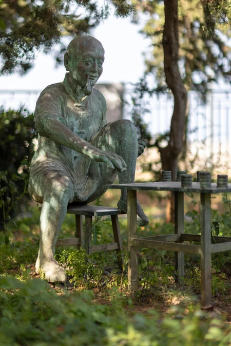 Chess Player Statue