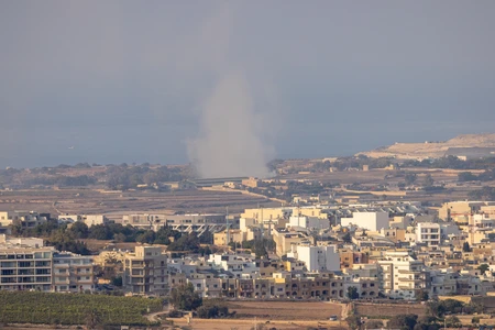 Coastal Cityscape with Smoke