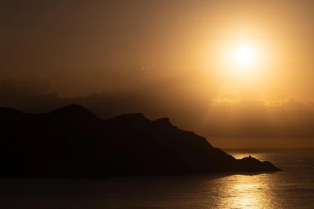 Sunset Over Ocean Horizon