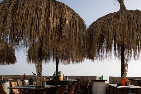 Beachside Cafe with Straw Umbrellas