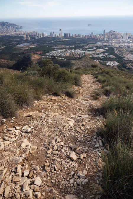 Mountain Trail Overlooking Cityscape