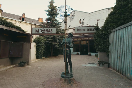 Quaint Courtyard with Sculpture