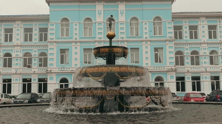Historic Fountain in Front of Classic Building