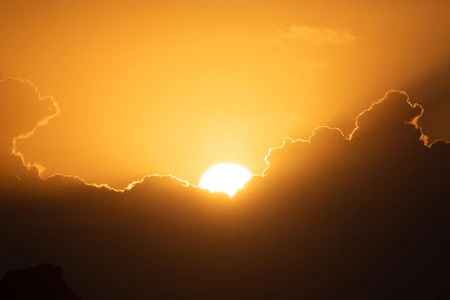 Sunset Behind Clouds