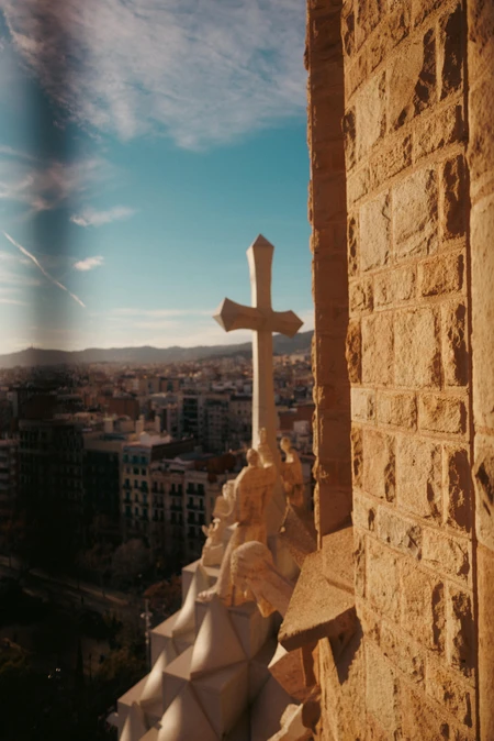 Rooftop Cross Overlooking Cityscape
