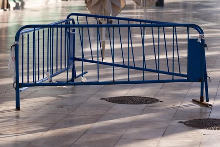 Blue Barricade on Pavement