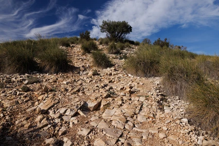 Rugged Landscape Under Blue Sky