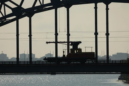 Silhouette of a Train on a Bridge