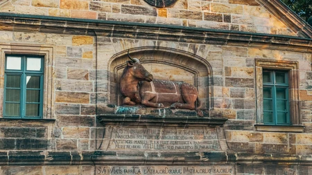 Historic Bull Carving on Building