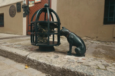 Street Sculpture of Dog and Cage