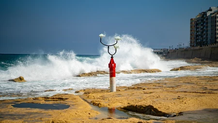 Coastal Waves Hitting Rocks