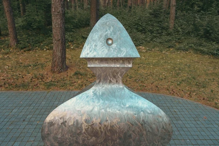 Metallic Sculpture in Forest