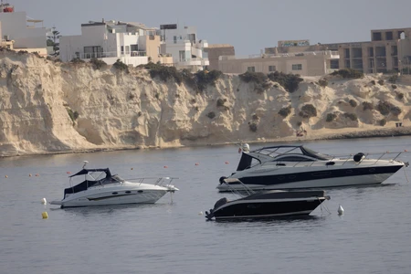 Boats by the Cliffs