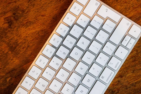 Modern Keyboard on Wooden Surface