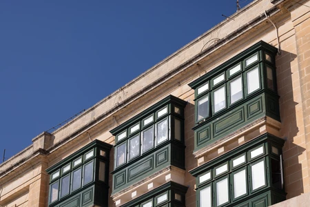 Traditional Architecture with Green Balconies