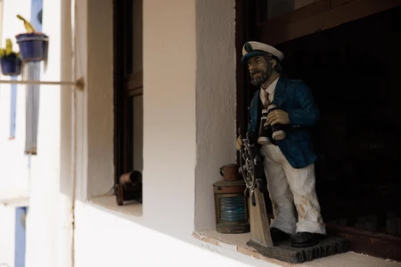 Coastal Decor with Sailor Sculpture