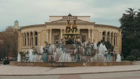 Ornate Fountain in Front of Historic Building